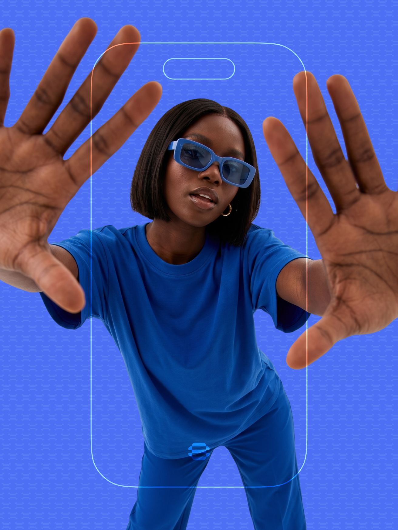Young woman in blue reaching toward the camera